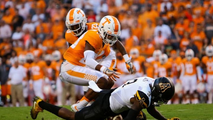 Sep 1, 2016; Knoxville, TN, USA; Appalachian State Mountaineers defensive back Alex Gray (3) recovers a fumbled punt in front of Tennessee Volunteers defensive back Cameron Sutton (23) during the first quarter at Neyland Stadium. Mandatory Credit: Randy Sartin-USA TODAY Sports