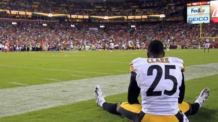 Aug 19, 2013; Landover, MD, USA; A Pittsburgh Steelers free safety Ryan Clark (25) watches from the sidelines against the Washington Redskins in the second quarter at FedEx Field. The Redskins won 24-13. Mandatory Credit: Geoff Burke-USA TODAY Sports