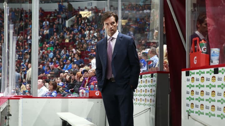 VANCOUVER, BC – OCTOBER 11: Head coach Dallas Eakins of the Edmonton Oilers looks on from the bench during their NHL game against the Vancouver Canucks at Rogers Arena October 11, 2014 in Vancouver, British Columbia, Canada. Vancouver won 5-4 in a shootout. (Photo by Jeff Vinnick/NHLI via Getty Images)
