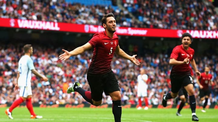 MANCHESTER, ENGLAND - MAY 22: Hakan Calhanoglu of Turkey celebrates after scoring his team's first goal during the International Friendly match between England and Turkey at Etihad Stadium on May 22, 2016 in Manchester, England. (Photo by Alex Livesey/Getty Images)