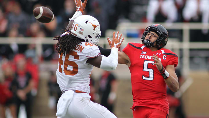 Nov 5, 2016; Lubbock, TX, USA; University of Texas Longhorns defensive back Malik Jefferson (46) tries to block a pass from Texas Tech Red Raiders quarterback Patrick Mahomes (5) in the second half at Jones AT&T Stadium. UT defeated Texas Tech 45-37. Mandatory Credit: Michael C. Johnson-USA TODAY Sports