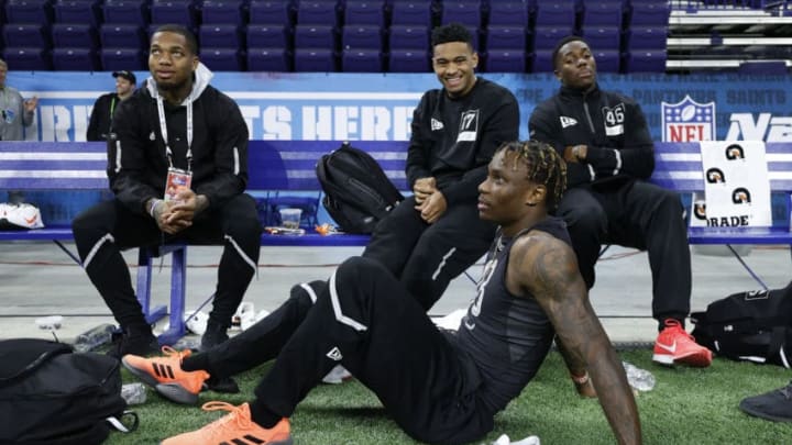 INDIANAPOLIS, IN - FEBRUARY 27: Wide receiver Henry Ruggs III of Alabama talks to quarterback Tua Tagovailoa of Alabama and wide receiver Lynn Bowden Jr. of Kentucky during the NFL Scouting Combine at Lucas Oil Stadium on February 27, 2020 in Indianapolis, Indiana. (Photo by Joe Robbins/Getty Images)