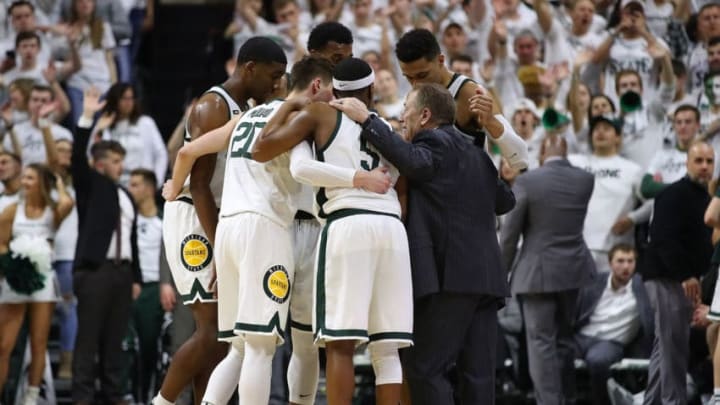 EAST LANSING, MI - MARCH 09: Head coach Tom Izzo of the Michigan State Spartans huddles with his team during the second half against the Michigan Wolverines at Breslin Center on March 9, 2019 in East Lansing, Michigan. (Photo by Gregory Shamus/Getty Images)