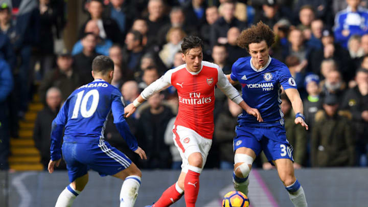 LONDON, ENGLAND - FEBRUARY 04: David Luiz of Chelsea battles for the ball with Mesut Oezil of Arsenal during the Premier League match between Chelsea and Arsenal at Stamford Bridge on February 4, 2017 in London, England. (Photo by Darren Walsh/Chelsea FC via Getty Images)