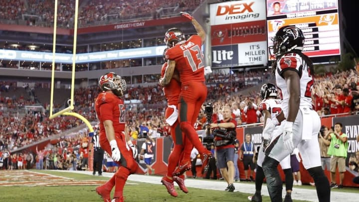 Nov 3, 2016; Tampa, FL, USA; Tampa Bay Buccaneers wide receiver Mike Evans (13) celebrates with teammates after scoring a touchdown against the Atlanta Falcons during the first quarter at Raymond James Stadium. Mandatory Credit: Kim Klement-USA TODAY Sports