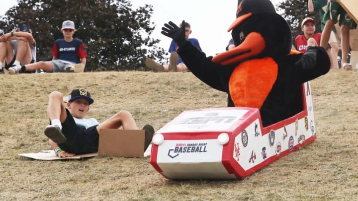 The Baltimore Orioles mascot cardboard sledding at the Little League World Series in South Williamsport, Pennsylvania, on Sunday, Aug. 21, 2022. The Red Sox and Baltimore Orioles played in the Little League Classic at Bowman Field on Sunday night.Classic