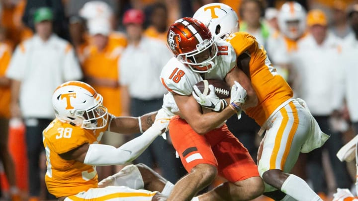 Bowling Green wide receiver Austin Osborne (18) is tackled Tennessee defensive back Theo Jackson (26) and linebacker Solon Page III (38) during an NCAA college football game between the Tennessee Volunteers and Bowling Green Falcons in Knoxville, Tenn. on Thursday, September 2, 2021.Ut Bowling Green