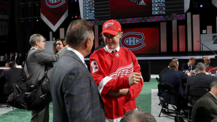 DALLAS, TX - JUNE 23: Jonatan Berggren reacts after being selected 33rd overall by the Detroit Red Wings during the 2018 NHL Draft at American Airlines Center on June 23, 2018 in Dallas, Texas. (Photo by Bruce Bennett/Getty Images)