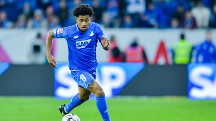 01 December 2018, Baden-Wuerttemberg, Sinsheim: Soccer: Bundesliga, 1899 Hoffenheim - FC Schalke 04, 13th matchday, in the Rhein-Neckar-Arena. Hoffenheim's Reiss Nelson plays the ball. Photo: Uwe Anspach/dpa - IMPORTANT NOTE: In accordance with the requirements of the DFL Deutsche Fußball Liga or the DFB Deutscher Fußball-Bund, it is prohibited to use or have used photographs taken in the stadium and/or the match in the form of sequence images and/or video-like photo sequences. (Photo by Uwe Anspach/picture alliance via Getty Images)