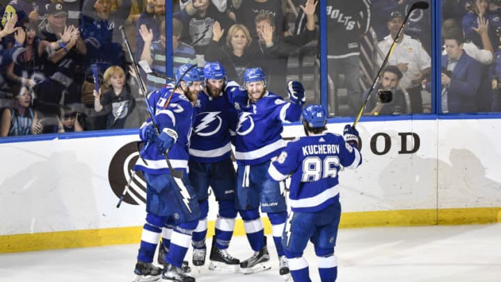 TAMPA, FL - MAY 06: Tampa Bay Lightning center J.T. Miller (10) celebrates his goal with Tampa Bay Lightning defender Victor Hedman (77), Tampa Bay Lightning center Steven Stamkos (91) and Tampa Bay Lightning right wing Nikita Kucherov (86) during the second period of an NHL Stanley Cup Eastern Conference Playoffs game between the Boston Bruins and the Tampa Bay Lightning on May 06, 2018, at Amalie Arena in Tampa, FL. (Photo by Roy K. Miller/Icon Sportswire via Getty Images)