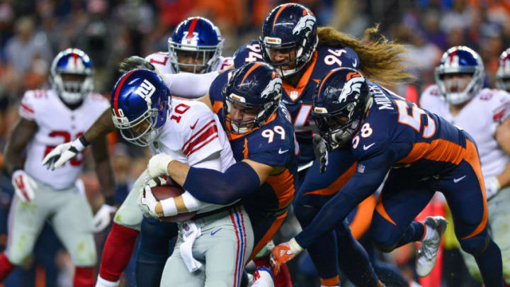 DENVER, CO - OCTOBER 15: Quarterback Eli Manning