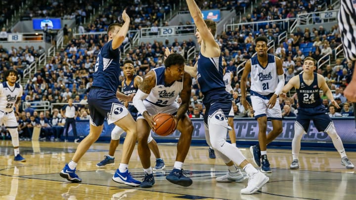 RENO, NV – NOVEMBER 06: Jordan Caroline #24 of the Nevada Wolf Pack looks for an opening against the Brigham Young Cougars at Lawlor Events Center on November 6, 2018 in Reno, Nevada. (Photo by Jonathan Devich/Getty Images)