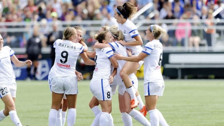 Aug 31, 2014; Tukwila, WA, USA; The FC Kansas City celebrate after FC Kansas City forward Amy Rodriguez (8) scored a goal against the Seattle Reign FC during the second half at Starfire Soccer Stadium. Kansas City defeated Seattle 2-1. Mandatory Credit: Steven Bisig-USA TODAY Sports