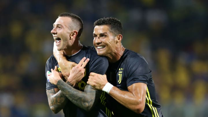 23rd September 2018, Stadio Benito Stirpe, Frosinone, Italy; Serie A football, Frosinone versus Juventus; Federico Bernardeschi of Juventus celebrates with Cristiano Ronaldo after scoring a goal in the 94th minute (photo by Giampiero Sposito/Action Plus via Getty Images)