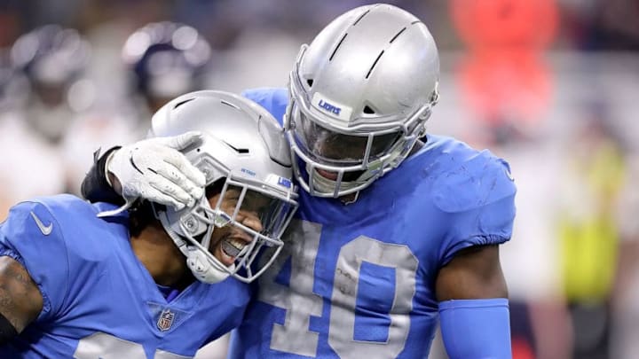 DETROIT, MI - NOVEMBER 22: Darius Slay #23 of the Detroit Lions and Jarrad Davis #40 of the Detroit Lions celebrate a sack of quarterback Chase Daniel #4 of the Chicago Bears at Ford Field on November 22, 2018 in Detroit, Michigan. (Photo by Leon Halip/Getty Images)