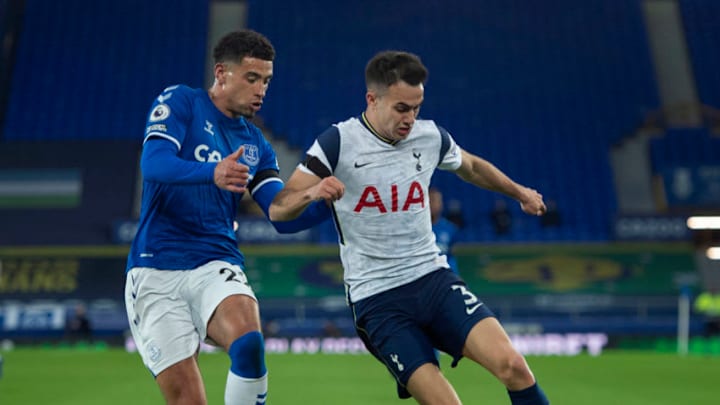 LIVERPOOL, ENGLAND - APRIL 16: Ben Godfrey of Everton and Sergio Reguilón of Tottenham Hotspur in action during the Premier League match between Everton and Tottenham Hotspur at Goodison Park on April 16, 2021 in Liverpool, United Kingdom. Sporting stadiums around the UK remain under strict restrictions due to the Coronavirus Pandemic as Government social distancing laws prohibit fans inside venues resulting in games being played behind closed doors. (Photo by Joe Prior/Visionhaus/Getty Images)