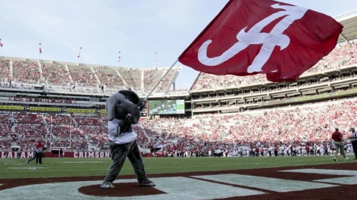 Sep 10, 2016; Tuscaloosa, AL, USA; Alabama Football mascot Big AL waves a flag during the game against the Western Kentucky Hilltoppers Hilltoppers at Bryant-Denny Stadium. The Tide defeated the Hilltoppers 38-10. Mandatory Credit: Marvin Gentry-USA TODAY Sports