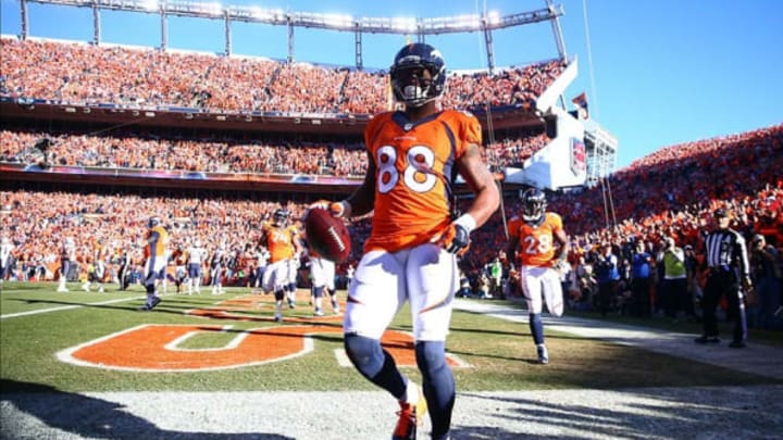 January 19, 2014; Denver, CO, USA; Denver Broncos wide receiver Demaryius Thomas (88) celebrates after he catches a touchdown pass against the New England Patriots in the second half of the 2013 AFC Championship football game at Sports Authority Field at Mile High. Mandatory Credit: Mark J. Rebilas-USA TODAY Sports