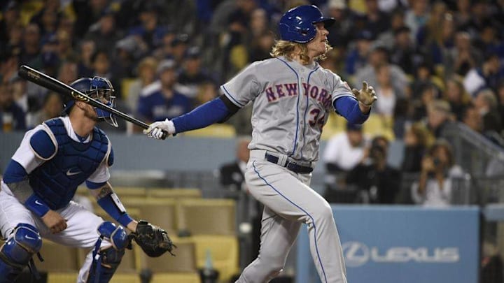 May 11, 2016; Los Angeles, CA, USA; New York Mets starting pitcher Noah Syndergaard (34) hits a three-run home run against the Los Angeles Dodgers during the fifth inning at Dodger Stadium. Mandatory Credit: Kelvin Kuo-USA TODAY Sports
