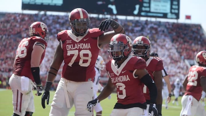 Oct 3, 2015; Norman, OK, USA; Oklahoma Sooners wide receiver Sterling Shepard (3) and Oklahoma Sooners offensive tackle Orlando Brown (78) celebrate after a touchdown against the West Virginia Mountaineers in the second quarter at Gaylord Family – Oklahoma Memorial Stadium. Mandatory Credit: Mark D. Smith-USA TODAY Sports