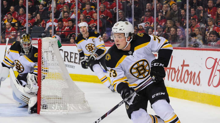 CALGARY, AB – FEBRUARY 21: Charlie McAvoy #73 of the Boston Bruins in action against the Calgary Flames during an NHL game at Scotiabank Saddledome on February 21, 2020 in Calgary, Alberta, Canada. (Photo by Derek Leung/Getty Images)