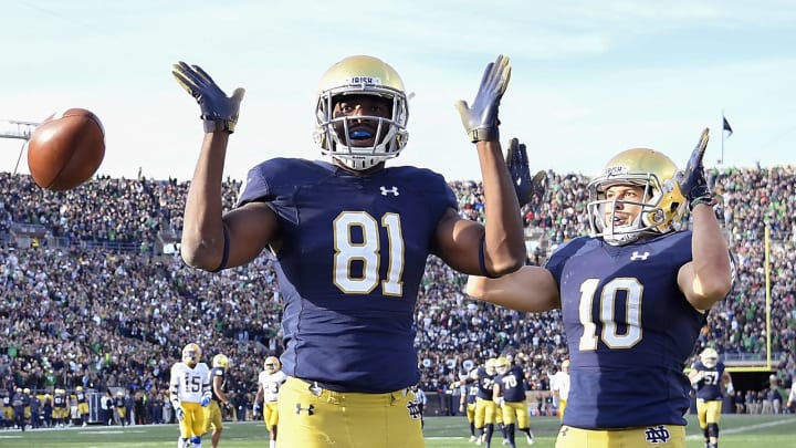 SOUTH BEND, IN – OCTOBER 13: Miles Boykin #81 of Notre Dame football reacts with Chris Finke #10 after scoring the touchdown to take the lead against the Pittsburgh Panthers in the second half at Notre Dame Stadium on October 13, 2018 in South Bend, Indiana. (Photo by Quinn Harris/Getty Images)