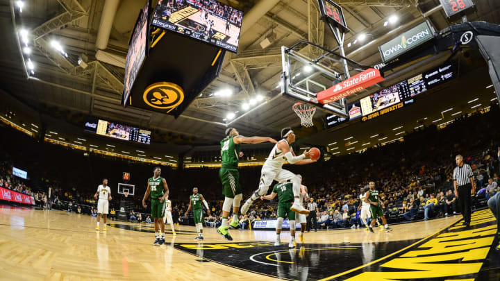 ASUN Basketball  Iowa Hawkeyes forward Cordell Pemsl (35) goes to the basket as Stetson Hatters forward Derick Newton Jeffrey Becker-USA TODAY Sports