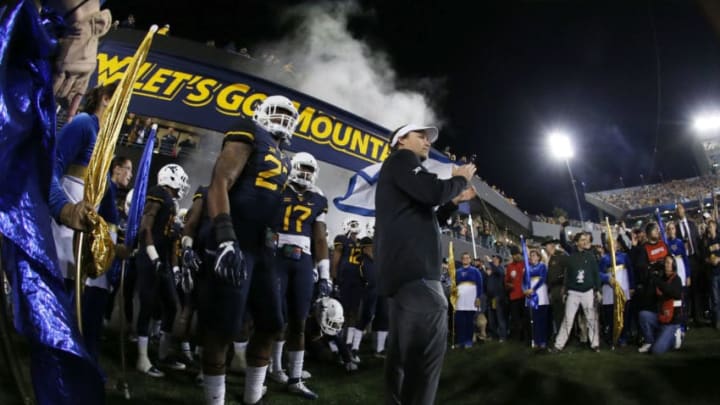 MORGANTOWN, WV - NOVEMBER 05: Dana Holgorsen and the West Virginia Mountaineers prepare to take the field against the Kansas Jayhawks during the game on November 5, 2016 at Mountaineer Field in Morgantown, West Virginia. (Photo by Justin K. Aller/Getty Images)