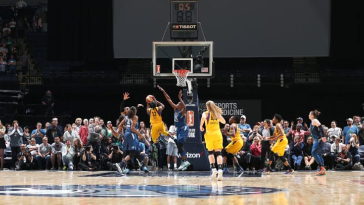 MINNEAPOLIS, MN - MAY 20: Chelsea Gray #12 of the Los Angeles Sparks shoots the game-winning shot bringin the final score to 77-76 against the Minnesota Lynx on May 20, 2018 at Target Center in Minneapolis, Minnesota. NOTE TO USER: User expressly acknowledges and agrees that, by downloading and or using this Photograph, user is consenting to the terms and conditions of the Getty Images License Agreement. Mandatory Copyright Notice: Copyright 2018 NBAE (Photo by David Sherman/NBAE via Getty Images)