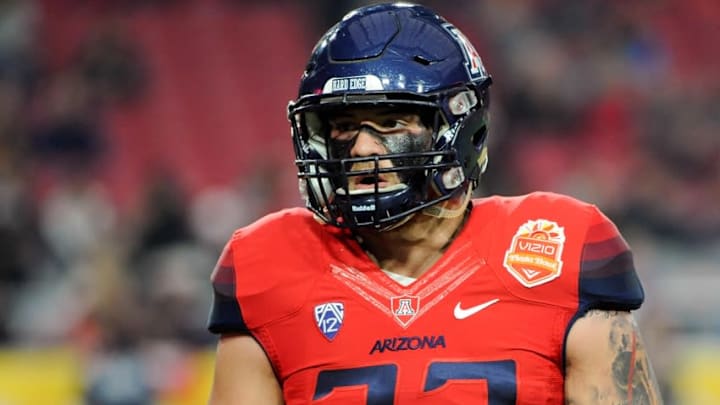 Dec 31, 2014; Glendale, AZ, USA; Arizona Wildcats linebacker Scooby Wright III (33) warms up before the first quarter against the Boise State Broncos in the 2014 Fiesta Bowl at Phoenix Stadium. The Broncos won 38-30. Mandatory Credit: Casey Sapio-USA TODAY Sports