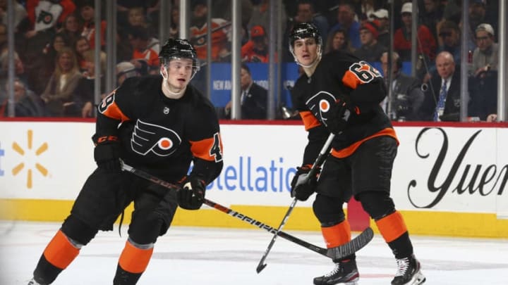 PHILADELPHIA, PA - JANUARY 11: Joel Farabee #49 and Nicolas Aube-Kubel #62 of the Philadelphia Flyers in action against the Tampa Bay Lightning at the Wells Fargo Center on January 11, 2020 in Philadelphia, Pennsylvania. The Lightning defeated the Flyers 1-0. (Photo by Mitchell Leff/Getty Images)