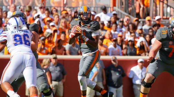 Sep 24, 2016; Knoxville, TN, USA; Tennessee Volunteers quarterback Joshua Dobbs (11) drops back to pass the ball against the Florida Gators during the first quarter at Neyland Stadium. Mandatory Credit: Randy Sartin-USA TODAY Sports