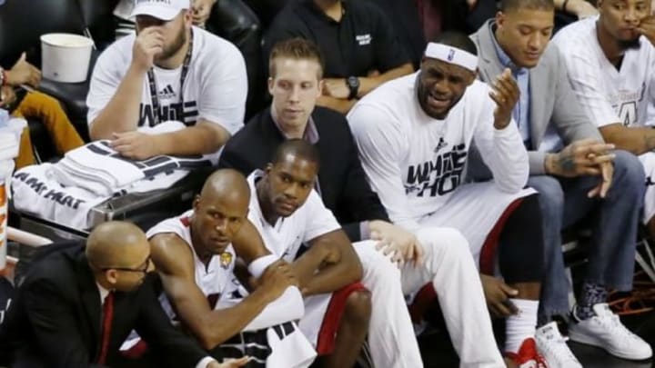 Jun 12, 2014; Miami, FL, USA; Miami Heat forward LeBron James reacts from the bench during the fourth quarter of game four of the 2014 NBA Finals against the San Antonio Spurs at American Airlines Arena. San Antonio defeated Miami 86-107. Mandatory Credit: Robert Mayer-USA TODAY Sports