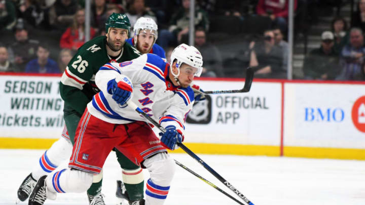 ST. PAUL, MN – FEBRUARY 13: New York Rangers Left Wing Michael Grabner (40) dumps the puck into the zone during an NHL game between the Minnesota Wild and New York Rangers on February 13, 2018, at Xcel Energy Center in St. Paul, MN. The Wild defeated the Rangers 3-2.(Photo by Nick Wosika/Icon Sportswire via Getty Images)