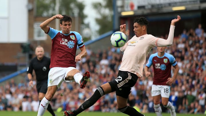 BURNLEY, ENGLAND - SEPTEMBER 02: Jack Cork of Burnley battles with Chris Smalling of Man Utd during the Premier League match between Burnley and Manchester United at Turf Moor on September 2, 2018 in Burnley, England. (Photo by Simon Stacpoole/Offside/Getty Images)