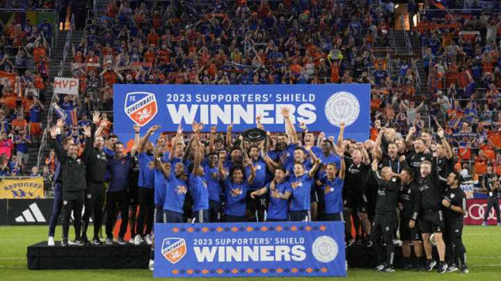 CINCINNATI, OHIO - OCTOBER 04: Luciano Acosta #10 of FC Cincinnati celebrates with teammates after receiving the Supporter's Shield following a MLS soccer match against the New York Red Bulls at TQL Stadium on October 04, 2023 in Cincinnati, Ohio. (Photo by Jeff Dean/Getty Images)
