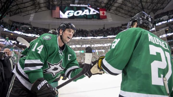 Oct 25, 2016; Dallas, TX, USA; Dallas Stars left wing Jamie Benn (14) and left wing Antoine Roussel (21) celebrate center Tyler Seguin (not pictured) goal against Winnipeg Jets during the third period at the American Airlines Center. The Stars defeat the Jets 3-2. Mandatory Credit: Jerome Miron-USA TODAY Sports