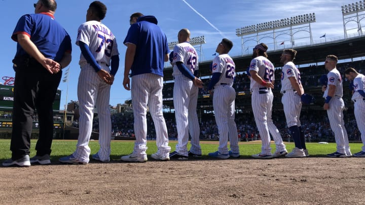 Sep 26, 2021; Chicago, Illinois, USA; The Chicago Cubs stand for the national anthem before the game against the St. Louis Cardinals at Wrigley Field. Mandatory Credit: David Banks-USA TODAY Sports