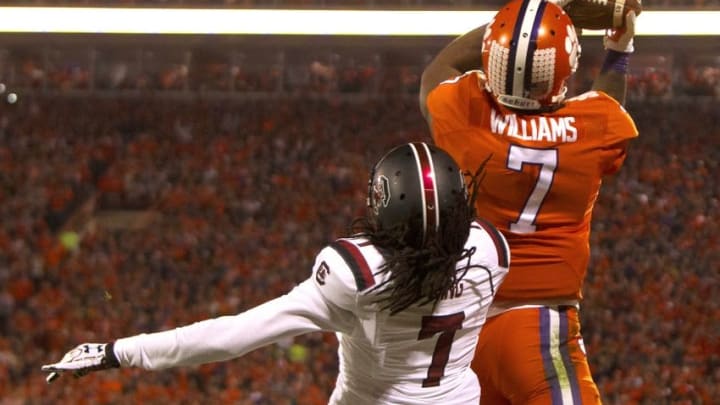 Nov 26, 2016; Clemson, SC, USA; Clemson Tigers wide receiver Mike Williams (7) catches a pass for a touchdown while being defended by South Carolina Gamecocks defensive back Jamarcus King (7) during the first quarter at Clemson Memorial Stadium. Mandatory Credit: Joshua S. Kelly-USA TODAY Sports