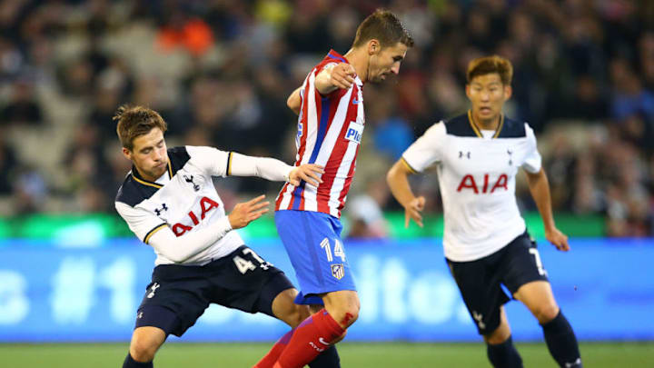 MELBOURNE, AUSTRALIA - JULY 29: Will Miller of Tottenham Hotspur and Gabi of Atletico de Madrid compete for the ball during 2016 International Champions Cup Australia match between Tottenham Hotspur and Atletico de Madrid at the Melbourne Cricket Ground on July 29, 2016 in Melbourne, Australia. (Photo by Scott Barbour/Getty Images)