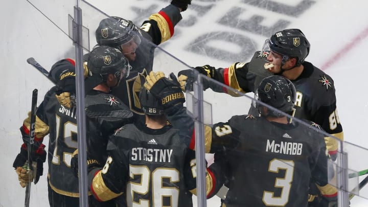 Reilly Smith #19 of the Vegas Golden Knights celebrates a goal against the Chicago Blackhawks with teammates during the third period in Game One of the Western Conference First Round.