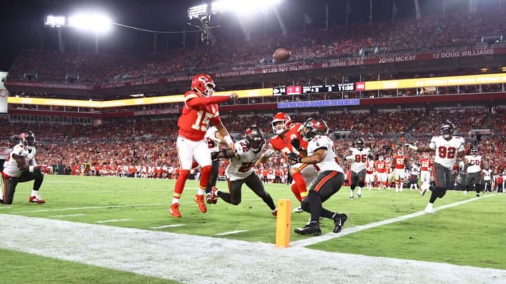 Oct 2, 2022; Tampa, Florida, USA; Kansas City Chiefs quarterback Patrick Mahomes (15) throws the ball in for a touchdown against the Tampa Bay Buccaneers during the first half at Raymond James Stadium. Mandatory Credit: Kim Klement-USA TODAY Sports