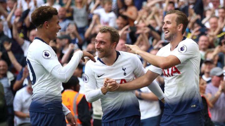 Tottenham Hotspur's Harry Kane (right) celebrates scoring his side's third goal of the game with team-mates Christian Eriksen (centre) and Dele Alli (right) during the Premier League match at Wembley Stadium, London. (Photo by Nick Potts/PA Images via Getty Images)