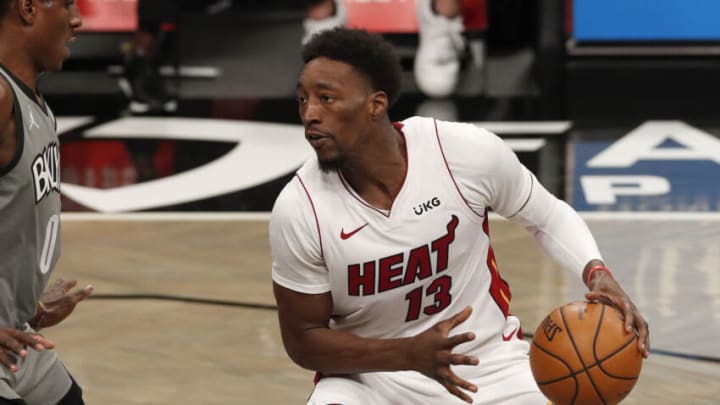 NEW YORK, NEW YORK - JANUARY 25: (NEW YORK DAILIES OUT) Bam Adebayo #13 of the Miami Heat in action against the Brooklyn Nets at Barclays Center on January 25, 2021 in New York City. The Nets defeated the Heat 98-85. NOTE TO USER: User expressly acknowledges and agrees that, by downloading and/or using this Photograph, user is consenting to the terms and conditions of the Getty Images License Agreement. (Photo by Jim McIsaac/Getty Images)