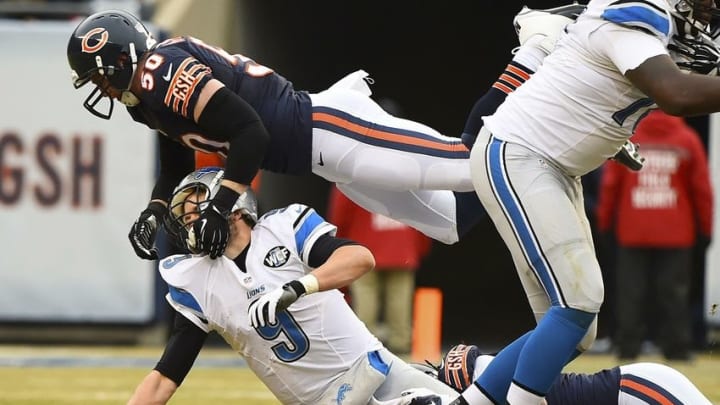 Dec 21, 2014; Chicago, IL, USA; Chicago Bears outside linebacker Shea McClellin (50) pressures Detroit Lions quarterback Matthew Stafford (9) during the second half at Soldier Field. Detroit Lions defeat the Chicago Bears 20-14. Mandatory Credit: Mike DiNovo-USA TODAY Sports
