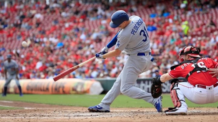 CINCINNATI, OH - SEPTEMBER 12: Joc Pederson #31 of the Los Angeles Dodgers hits a home run in the fourth inning against the Cincinnati Reds at Great American Ball Park on September 12, 2018 in Cincinnati, Ohio. (Photo by Andy Lyons/Getty Images)