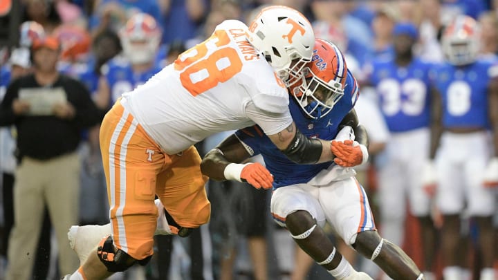 Tennessee offensive lineman Cade Mays (68) tackles Florida wide receiver Jacob Copeland (1) during the first quarter of an NCAA football game against Florida at Ben Hill Griffin Stadium in Gainesville, Florida on Saturday, Sept. 25, 2021.Tennflorida0925 0573