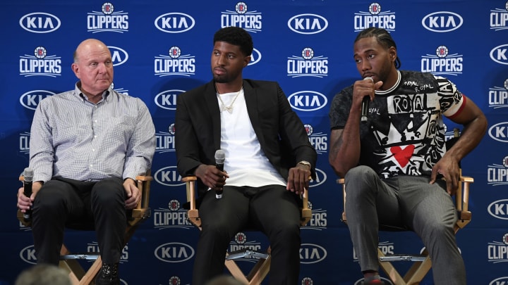 Kawhi Leonard speaks during his introductory news conference with Paul George (Photo by Kevork Djansezian/Getty Images)