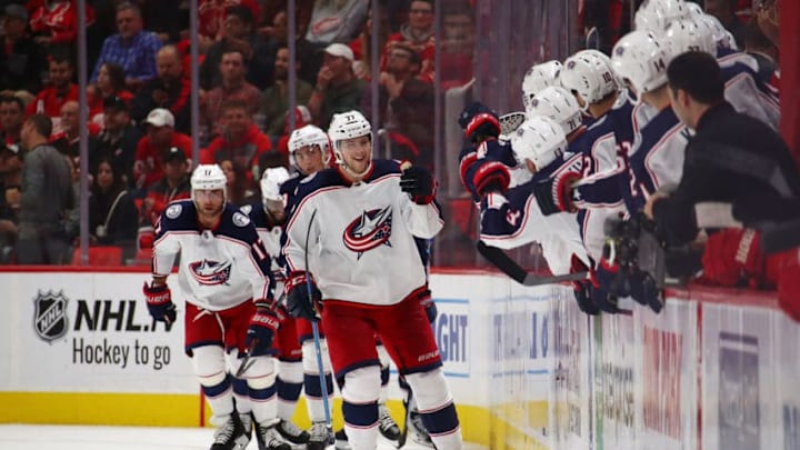 DETROIT, MI - OCTOBER 04: Josh Anderson #77 of the Columbus Blue Jackets celebrates his second period goal with teammates while playing the Detroit Red Wings at Little Caesars Arena on October 4, 2018 in Detroit, Michigan. (Photo by Gregory Shamus/Getty Images)