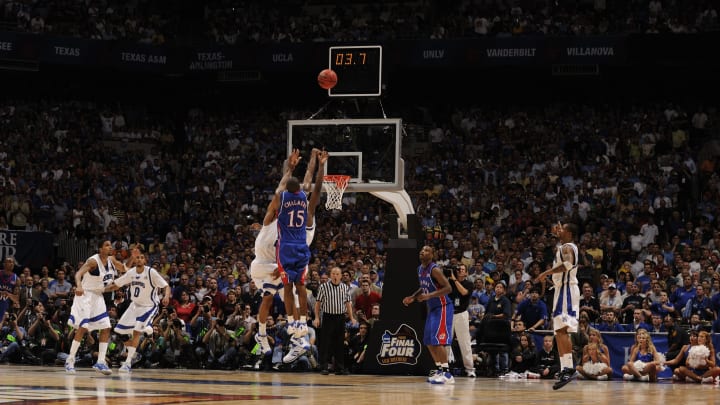 07 APR 2008: Mario Chalmers (15) of the University of Kansas hits a three point basket to send the game into overtime during the Division I Men’s Final Four Basketball Championship Game held at the Alamodome in San Antonio, TX. Kansas defeated Memphis 75-68 to claim the championship title. Rich Clarkson/NCAA Photos via Getty Images